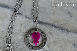 Stainless Steel Be bold, be brave, be confidents with a hanging purple upside down pineapple necklace