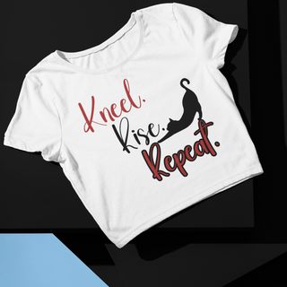 White t-shirt with red text and silhouette graphic on a black and blue gradient background