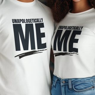 Two people wearing white t-shirts with 'UNAPOLOGETICALLY ME' text, standing close together.