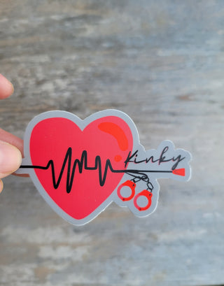 Kinky BDSM Sticker for tumblers, computer, cups, and much more. Sticker shows a whip, handcuffs and the beating heart with strong rhythm