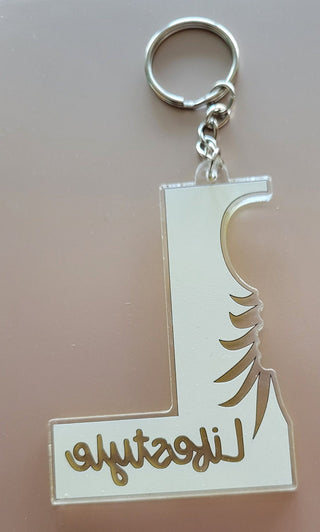 Lifestyle Keychain / Zipper Pull with the letter L, Lifestyle, and an outline of an upside down pineapple, Alternative Lifestyle Keychain