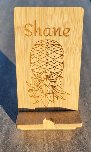 Personalized Upside Down Pineapple Bamboo Wood Phone Holder, Swinger lifestyle decor, Unfinished Raw Wood, Cell Phone Stand